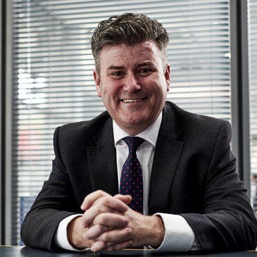 Professional headshot of a smiling Paul Gilhooly of Gratte Brothers Catering Equipment Limited