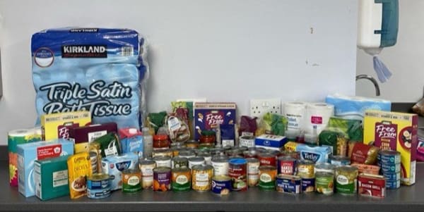 Assortment of tinned food, toilet roll and other cupboard essentials donated by our Stevenage-based team.