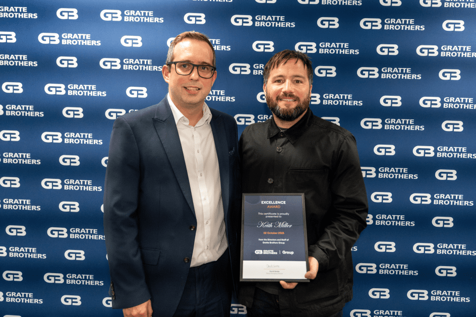 Keith Miller receiving his award from David Gratte at the Excellence Awards 2025.