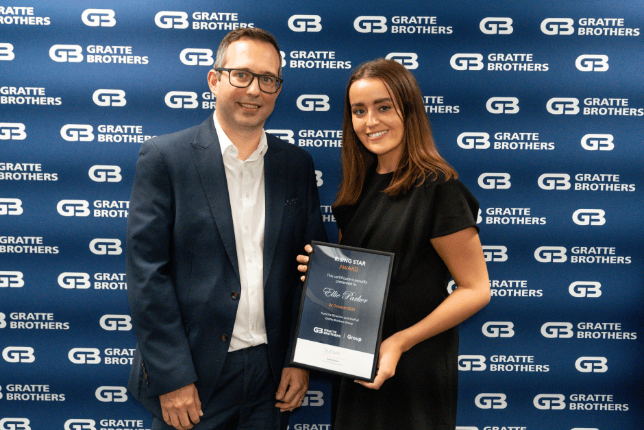 Ellie Parker receiving her award from David Gratte at the Excellence Awards 2025.