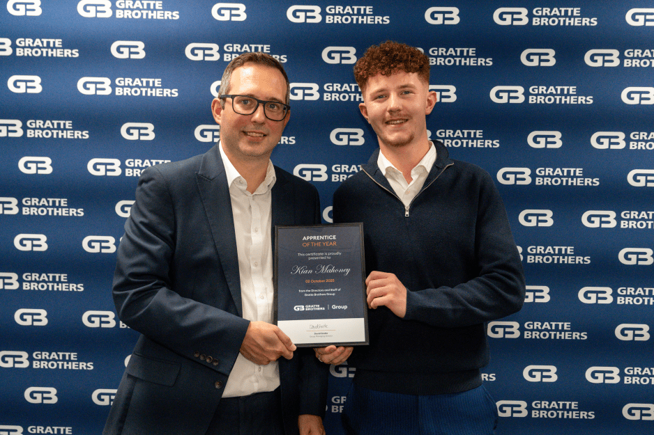 Kian Mahoney receiving his award from David Gratte at the Excellence Awards 2025.