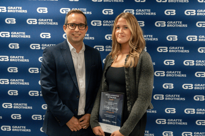 Ruby Hornby receiving her award from David Gratte at the Excellence Awards 2025.