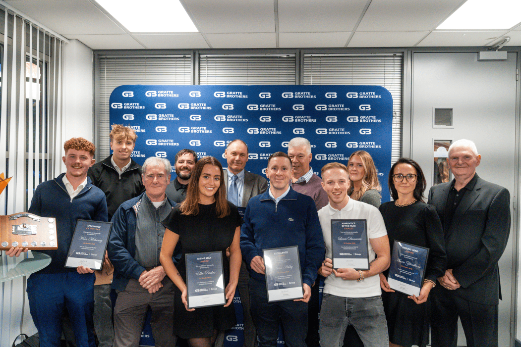Group shot of the winners & retirees at the Excellence Awards 2025.